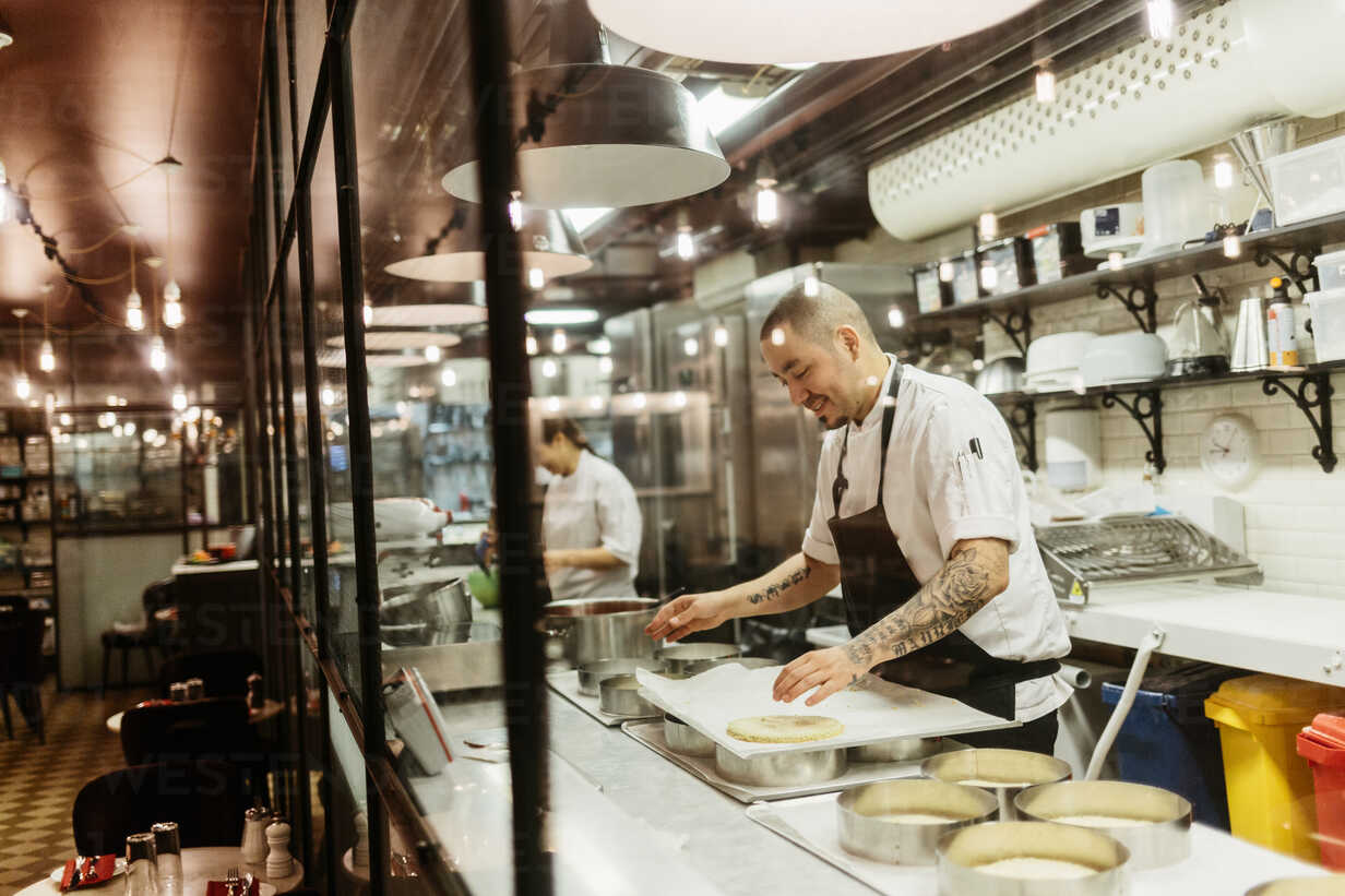 Bakery chefs working in kitchen