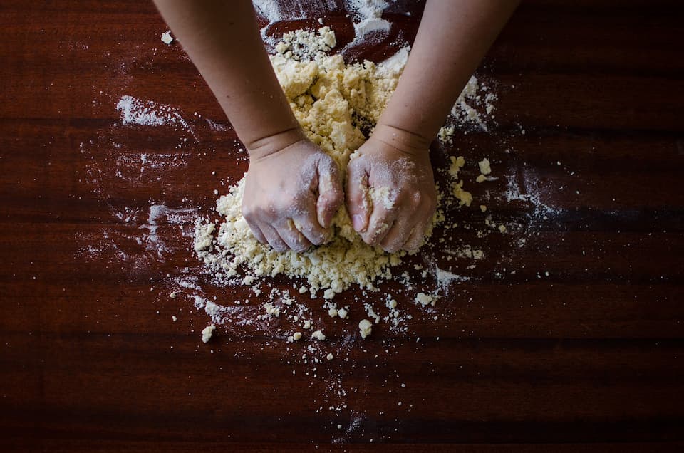 Person kneading dough